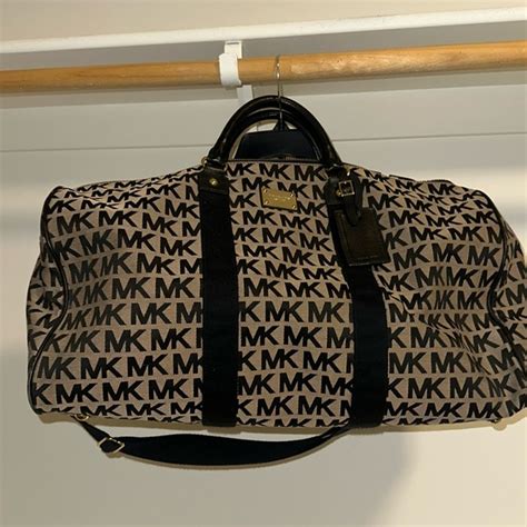 michael kors duffle bag free|Michael Kors duffle bag outlet.